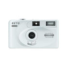 Silver Reto Project PANO 35mm film camera with a 22mm wide-angle lens, built-in flash, and panoramic mode selector.