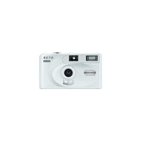 Silver Reto Project PANO 35mm film camera with a 22mm wide-angle lens, built-in flash, and panoramic mode selector.