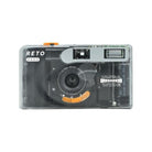 Reto PANO 35mm film camera in a compact, clear plastic body with a 22mm wide-angle lens and manual controls.