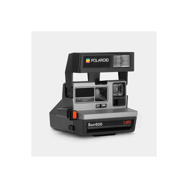 Retrospekt silver and black Polaroid Sun 600 LMS instant camera with built-in flash and light management system.