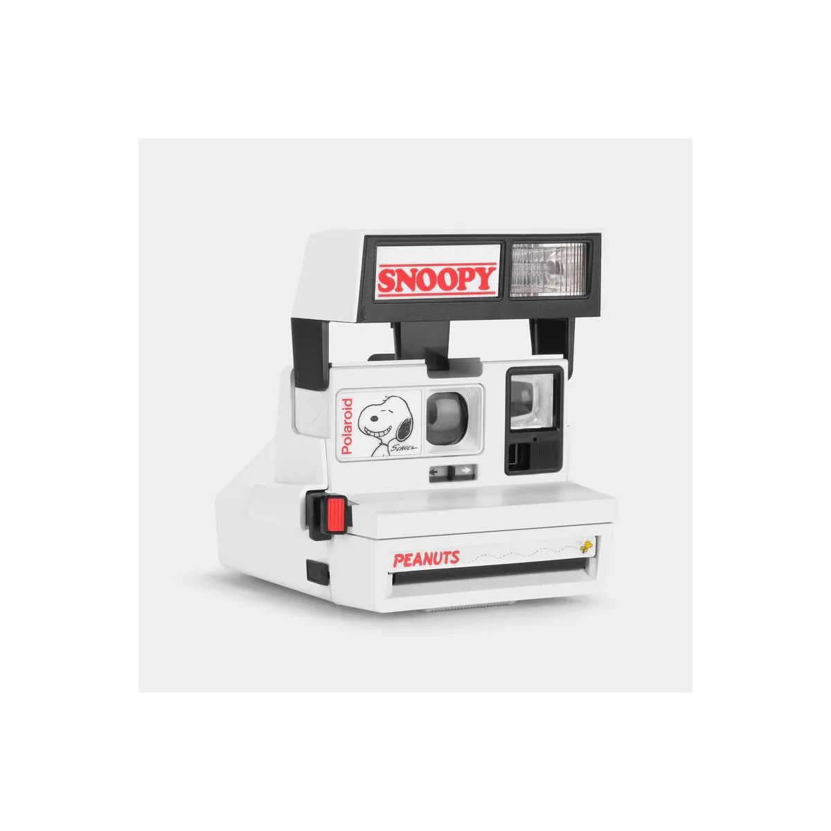 Retrospekt Polaroid 600 instant camera in white with Snoopy and Woodstock Peanuts branding and a red shutter button.