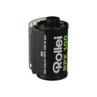 Rollei RPX 100 ISO 35mm black and white film canister with 36 exposures, featuring a black metal casing and white text.