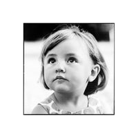 Black and white photo of a young girl looking to the side