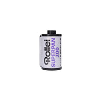 Rollei Superpan 200 ISO 35mm black and white film canister with white label and purple text on a white background.