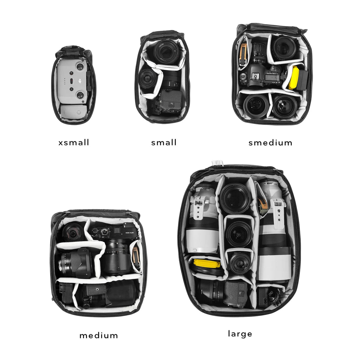 Set of camera bags in different sizes on a white background