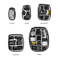 Set of camera bags in different sizes on a white background
