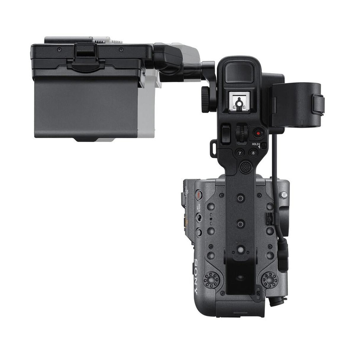 Top-down view of the compact Sony FX6 cinema camera body in matte gray with an attached handle and flip-out LCD screen.