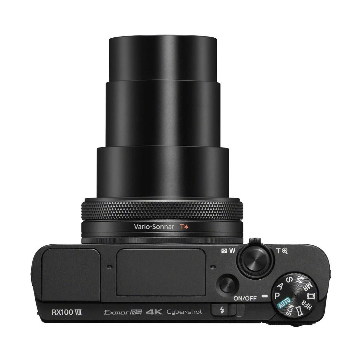 Top view of black Sony RX100 VII digital camera with extended ZEISS lens, mode dial, and compact metal body design.