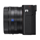 Black Sony RX1R III compact camera featuring a fixed ZEISS 35mm f/2 lens with manual aperture and focus rings.