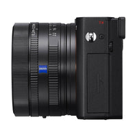 Black Sony RX1R III compact camera featuring a fixed ZEISS 35mm f/2 lens with manual aperture and focus rings.