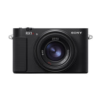 Compact black Sony RX1R III digital camera with a fixed ZEISS Sonnar 35mm f/2 lens and textured grip.