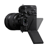 Black Sony a7R VI mirrorless camera with a 4-axis articulating touchscreen LCD and professional dial controls.