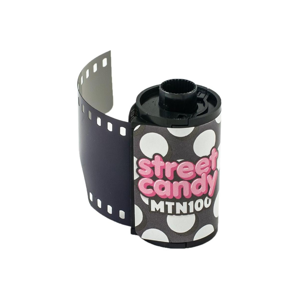 Street Candy MTN 100 35mm black and white film canister with a polka dot label and pink logo on a white background.