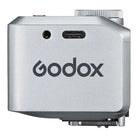 Silver Godox device on a white background
