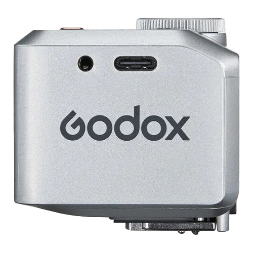 Silver Godox device on a white background