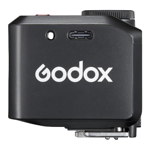 Black Godox device with USB port and logo on a white background