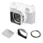 White camera with lens hood and filter on a white background