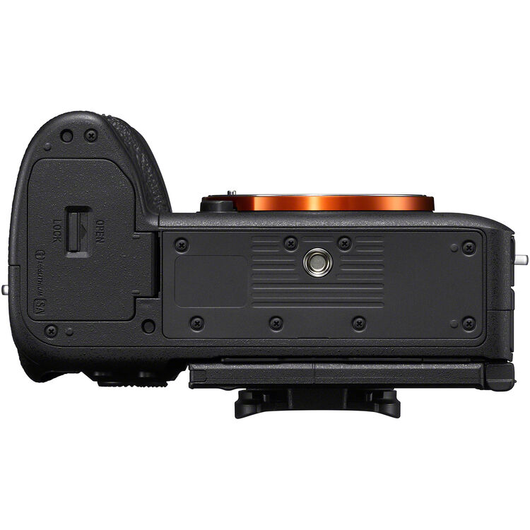 Camera body with lens on a white background