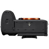Camera body with lens on a white background