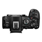 Top view of a black camera body on a white background