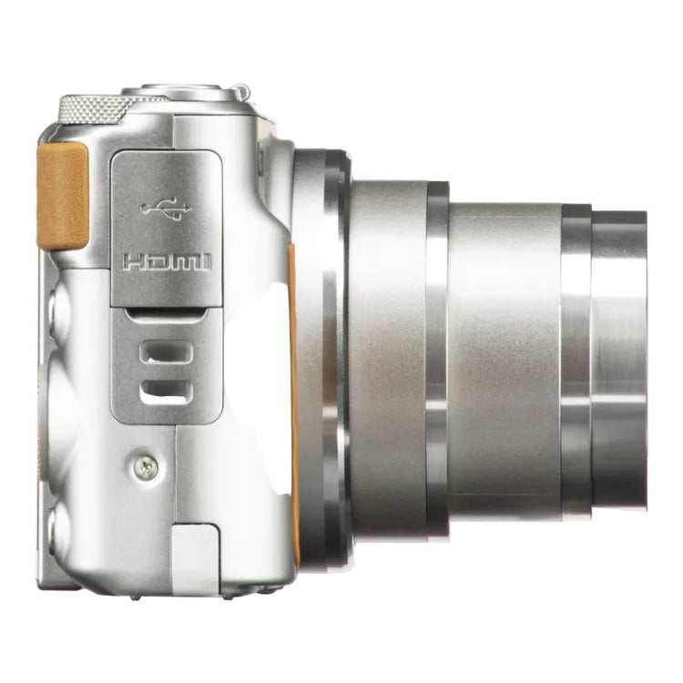 Silver camera with a brown grip on a white background