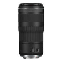 Black camera lens on a white background