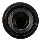 Close-up of a camera lens on a white background