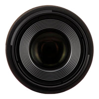 Close-up of a camera lens on a white background