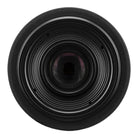Close-up of a camera lens on a white background