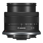 Canon camera lens with focus scale and brand logo on a white background