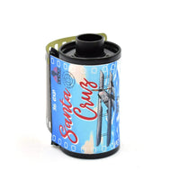 Film canister with 'Santa Cruz' branding on a white background