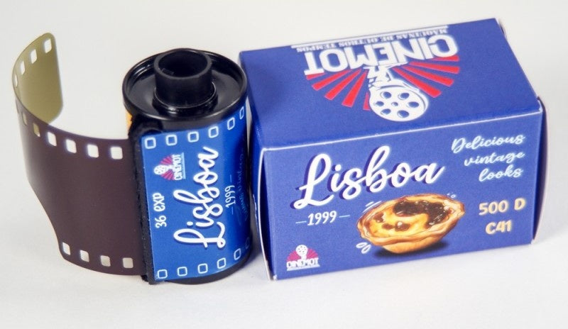 Vintage Cinemot Lisboa 500 D film roll with a partially unrolled brown film strip next to its blue illustrated box on a white background.