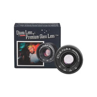 A Lomography Diana Premium Glass Lens packaging with a black and white image of a person on the box, a black circular lens on the front, and a purple tinted lens beside it.