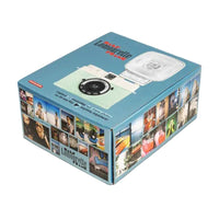 Lombrizzate Foto Matto box for a compact instant camera, featuring a light blue packaging design with a photo camera illustration and a collage of sample prints on the sides.