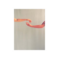 A minimalist art print featuring two human arms reaching toward each other against a plain light gray background, styled like a poster with a white border.