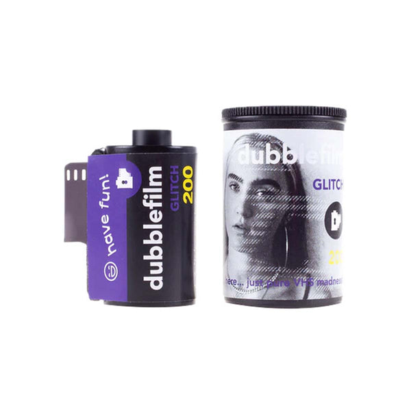 A roll of Dubble Fun! double-exposure film next to its canister packaging, featuring a black and purple design with a stylized portrait of a woman on the label.