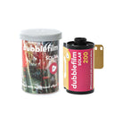 A roll of Dubblefilm Solar 200 color negative film shown next to its gray plastic canister, which features a colorful sun-kissed floral design. The film roll has a gold-tone backing strip visible on the right side, all set against a plain white background.