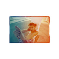 A rectangular canvas print featuring a stylized, warm-toned photograph of a woman stretching, displayed on a clean white background.