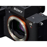 Sony camera with lens mount on a white background
