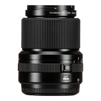 Fujinon GF 30mm lens in black with textured grip rings and a small orange accent on the focus switch, shown against a plain white background.