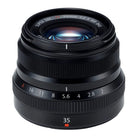 Camera lens with focus and aperture controls on a white background