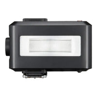 Black camera flash on a white background