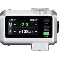 Silver electronic device with digital display on a white background