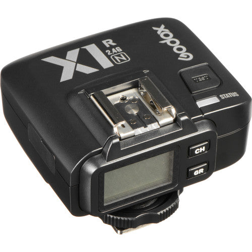 Godox camera flash transmitter on a white background