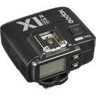 Godox camera flash transmitter on a white background