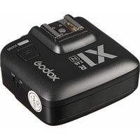 Godox camera flash receiver on a white background