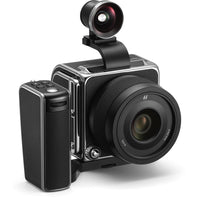 Camera with lens and additional attachment on a white background