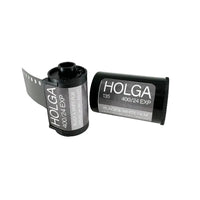 Two rolls of Holga 400/24 Exp Black & White Film shown on a clean white background, with one roll partially unrolled to display the film strip.