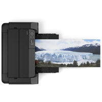 Black printer with a printed image of a glacier on a white background