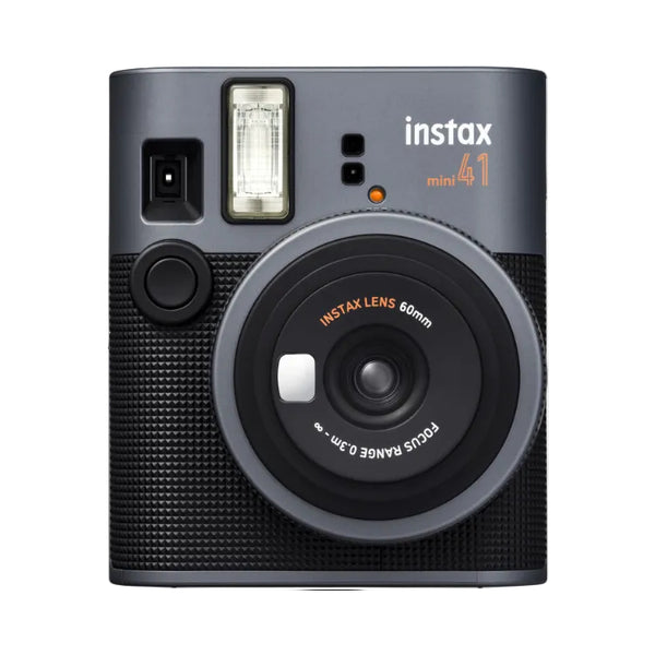 Instax camera with lens and flash on a white background